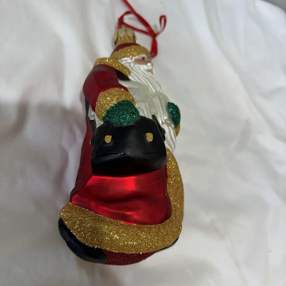 1999 Patricia Breen Through Rain and‎ Snow Santa Ornament Red Coat Bag Glass Vtg